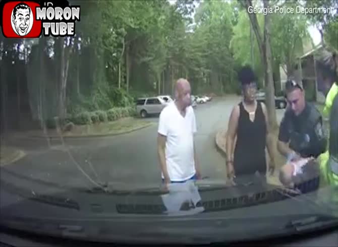 Video :A baby in Georgia who was choking and becoming blue is saved by a former marine who is now a police officer
